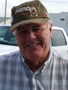 Leo Hoehn all smiles, sporting an Agro-K hat.